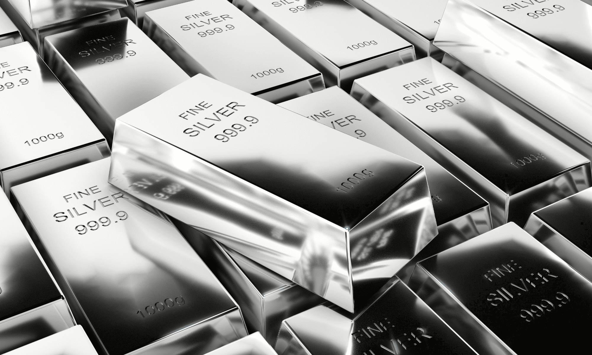 A collection of silver bars with 'FINE SILVER 999.9' and '1000g' labels, with 'FINE SILVER 999.