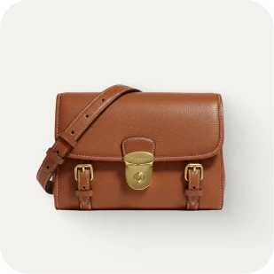Brockton MA A small, brown leather bag with a gold lock and strap
