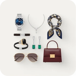 A selection of luxury items including a watch, necklace, scarf, sunglasses, and handbag, all available at a pawn shop in