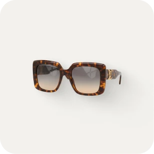 Brockton MA A pair of sunglasses with a tortoiseshell frame and gradient lenses, set against a white background