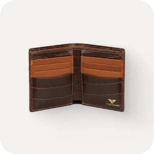 Brockton MA A wallet with a brown leather exterior and a tan leather interior