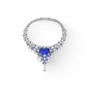 A ring with a blue gemstone and diamonds on a white background in Brockton MA