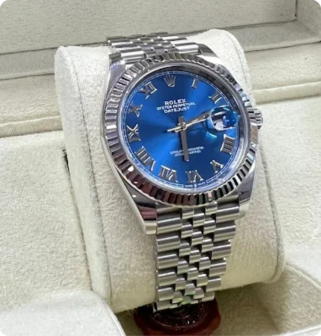 Brockton MA A Rolex watch on a white velvet pillow